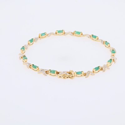 Bracelet ligne émeraudes diamants