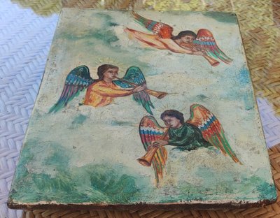 Antique religious painting on wood depicting musical angels