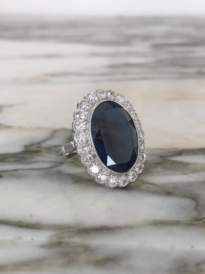 Important daisy ring in 18K white gold with sapphire and diamonds