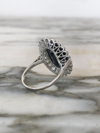 Important daisy ring in 18K white gold with sapphire and diamonds