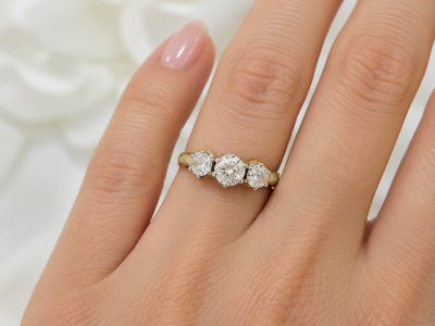 Antique trilogy ring in yellow gold, platinum and diamonds
