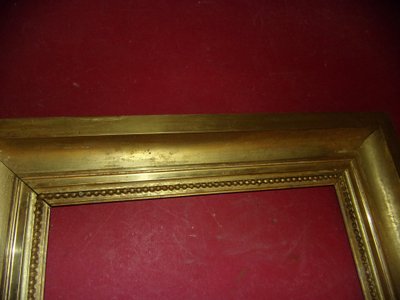 Coppia di cornici del XIX secolo in legno dorato.