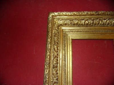 Coppia di cornici del XIX secolo in legno dorato.