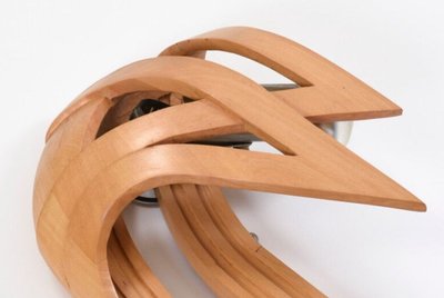 Vincent Gonzalez: 1970s-style curved wood carved wall sconce