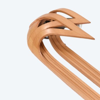 Vincent Gonzalez: 1970s-style curved wood carved wall sconce