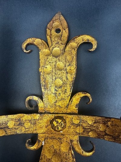 Pair of gilded wrought-iron Gothic wall sconces with built-in lighting