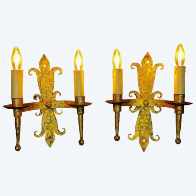 Pair of gilded wrought-iron Gothic wall sconces with built-in lighting