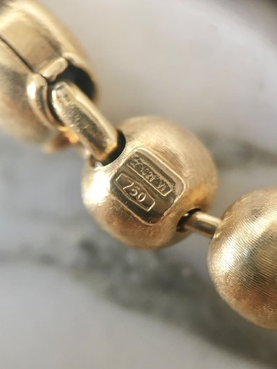 Bracciale con perline in oro giallo 18 carati