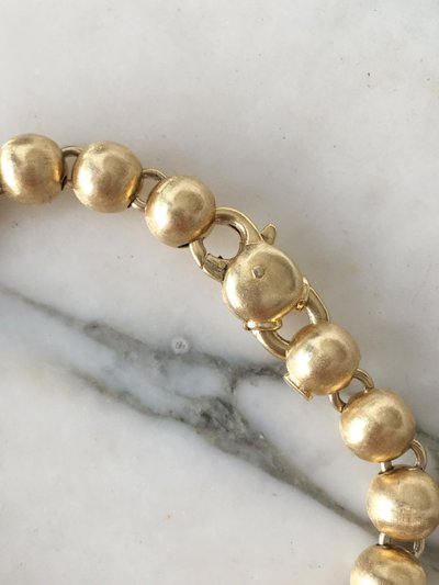 Bracciale con perline in oro giallo 18 carati