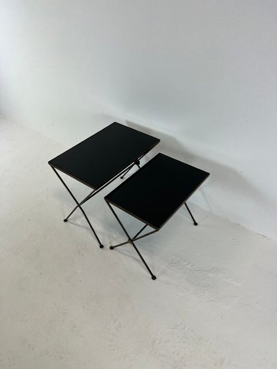 Modernist nesting tables made of metal and black glass, 1950s