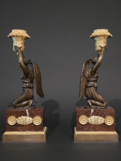 Pierre Chiboust, Pair of candlesticks signed with winged victory figures, Empire period.