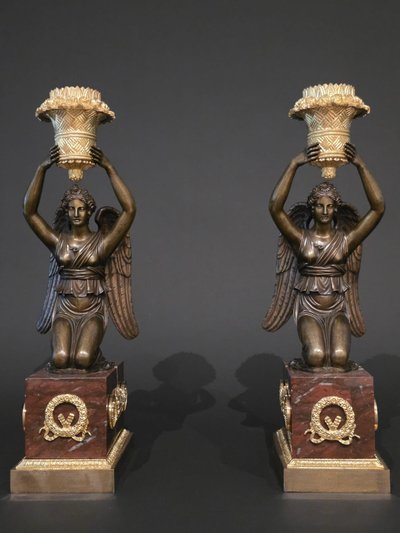 Pierre Chiboust, Pair of candlesticks signed with winged victory figures, Empire period.