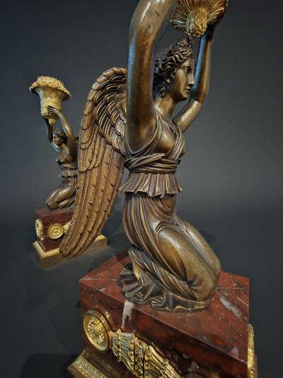 Pierre Chiboust, Pair of candlesticks signed with winged victory figures, Empire period.