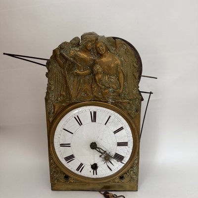 Comtoise clock movement with three bells and a brass pediment