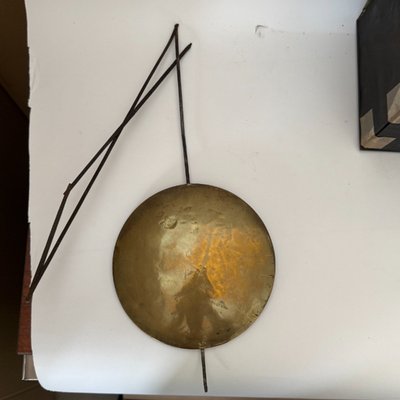 Comtoise clock movement with three bells and a brass pediment