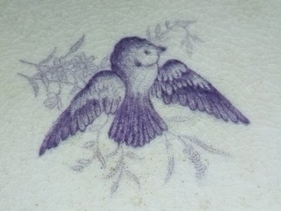 GIEN CUP on a Flat Footed Antique Faience Cookie Plate with Floral and Purple Bird Motif, "LISERONS" Model