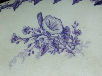 GIEN CUP on a Flat Footed Antique Faience Cookie Plate with Floral and Purple Bird Motif, "LISERONS" Model