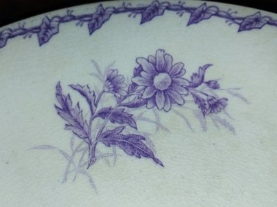 GIEN CUP on a Flat Footed Antique Faience Cookie Plate with Floral and Purple Bird Motif, "LISERONS" Model