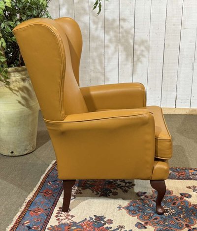 Paire de fauteuil anglais à oreilles des années 1980 en cuir 