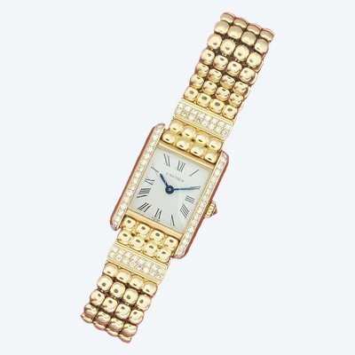 Orologio Cartier Tank Louis Cartier mini, in oro giallo e diamanti.