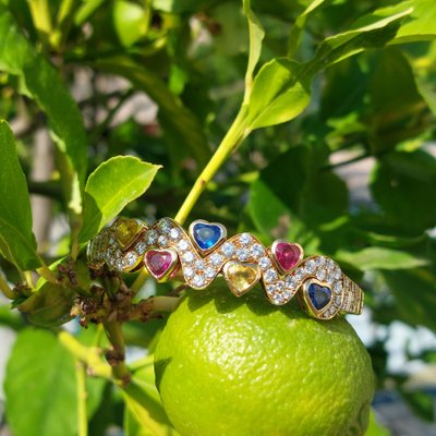 Cristilli diamond and colored sapphire heart-shaped bangle bracelet
