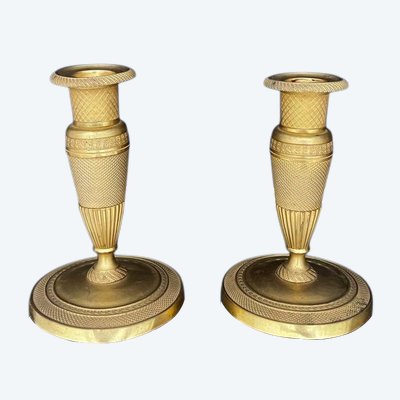 Pair of gilded brass candlesticks, Empire style