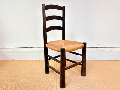 SET OF 4 BRUTALIST SOLID WOOD CHAIRS BY GEORGES ROBERT, CIRCA 1950.