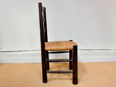 SET OF 4 BRUTALIST SOLID WOOD CHAIRS BY GEORGES ROBERT, CIRCA 1950.