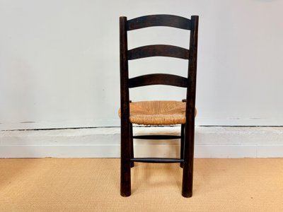 SET OF 4 BRUTALIST SOLID WOOD CHAIRS BY GEORGES ROBERT, CIRCA 1950.