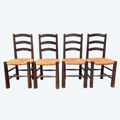 SET DI 4 SEDIE IN STILE BRUTALISTA IN LEGNO MASSICCIO DI GEORGES ROBERT, INTORNO AL 1950.
