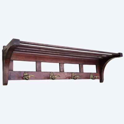 Antique mahogany wall-mounted coat rack, circa 1900–1930