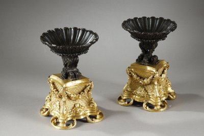 PAIR OF GILT AND PATINATED BRONZE CUPS, 19TH CENTURY