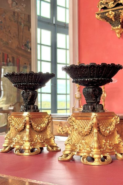 PAIR OF GILT AND PATINATED BRONZE CUPS, 19TH CENTURY