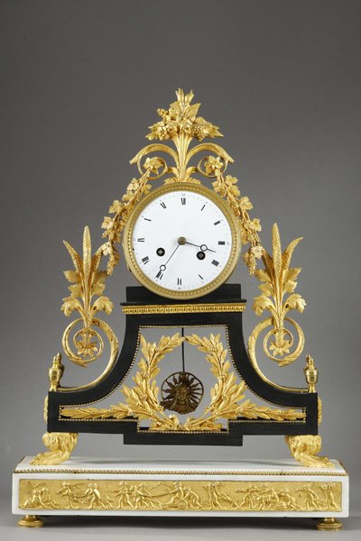 LARGE DIRECTOIRE CLOCK IN PATINATED AND GILT BRONZE