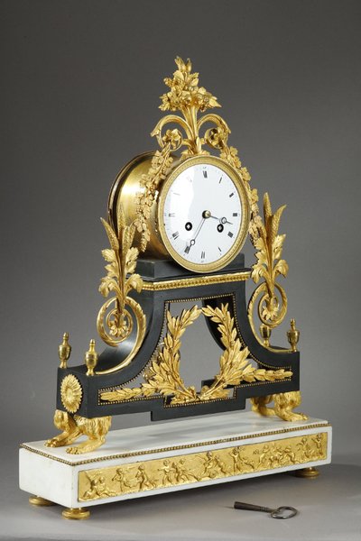 LARGE DIRECTOIRE CLOCK IN PATINATED AND GILT BRONZE