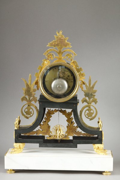 LARGE DIRECTOIRE CLOCK IN PATINATED AND GILT BRONZE