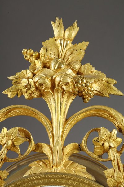 LARGE DIRECTOIRE CLOCK IN PATINATED AND GILT BRONZE