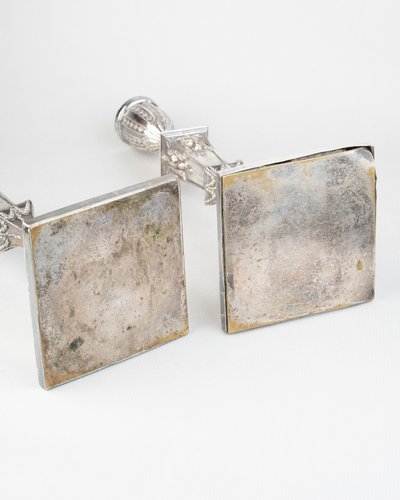 Pair of silver-plated copper candlesticks, Empire period