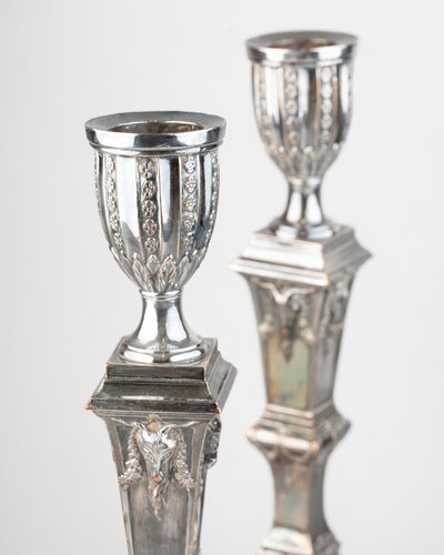 Pair of silver-plated copper candlesticks, Empire period