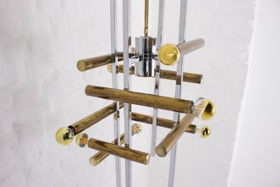 Large brass and chrome pendant light, Hollywood Regency style.