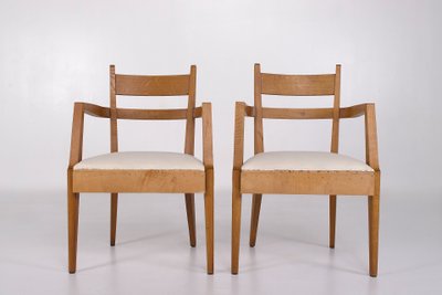 René-Jean Caillette armchairs in blond oak.
