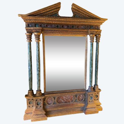 Miroir architectural à fronton et colonnes détachées en bois peint et doré
