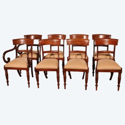 suite de 6 chaises et deux fauteuils en acajou du début du 19° siècle