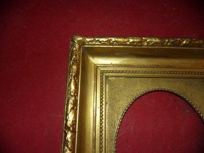19th-century frame, in gilded wood.