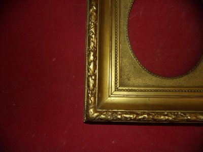 19th-century frame, in gilded wood.