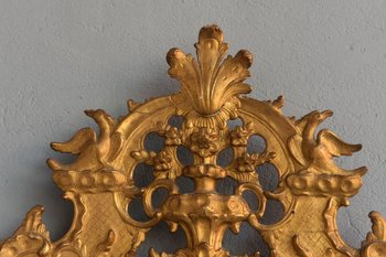 Specchio grande con pare vicino Luigi XIV "La diciottesima volta in legno dorato"