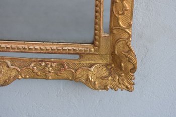Specchio grande con pare vicino Luigi XIV "La diciottesima volta in legno dorato"