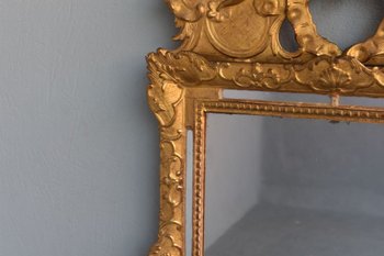 Specchio grande con pare vicino Luigi XIV "La diciottesima volta in legno dorato"