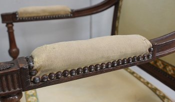 Poltrona in noce, stile Luigi XVI - Inizio XIX secolo