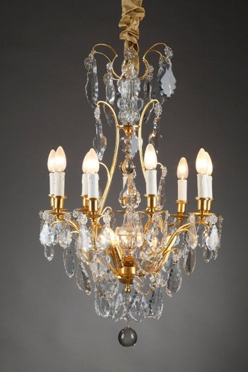Eight Arm Gilt Bronze Chandelier With Tassels